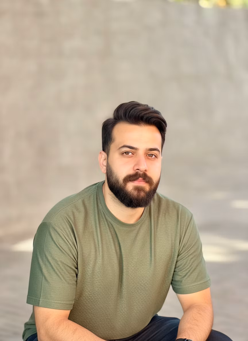 Hamed Beig – Transform this casual outdoor portrait into a professional profile picture. Crop closer to focus on the upper body an…
