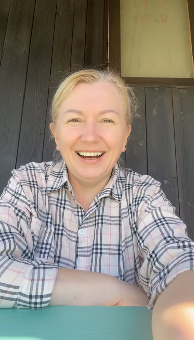 Ольга – Transform this person's frightened facial expression into a joyful, laughing expression. Make the eyes crinkled and s…