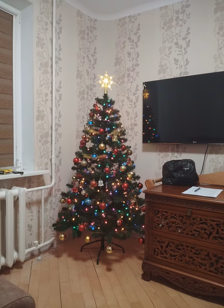 Дмитрий Александрович – In the provided image of a cozy room corner with light wallpaper, a window with radiator, and a mounted TV, replace t…