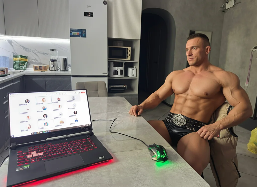 200 gb – Using the provided kitchen scene, add a muscular man sitting on the beige cushioned chair on the right side. The man …