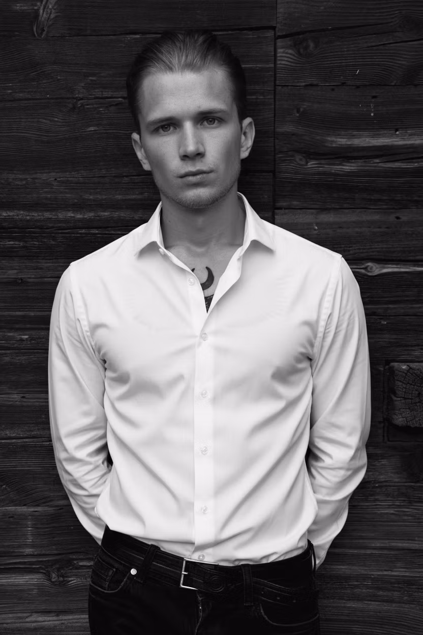 НБН НБН – Using the provided image of the young man, please make two key changes: 1) Remove the round glasses completely from h…