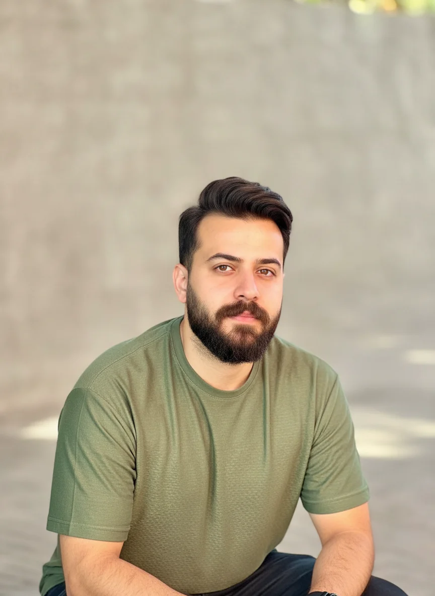 Hamed Beig – Transform this casual outdoor portrait into a professional profile picture. Crop closer to focus on the upper body an…