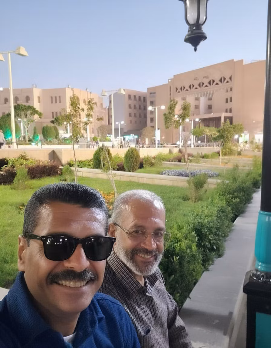 صادق حمزه پور – Completely remove all existing eyeglasses from both men and replace them with identical Ray-Ban Aviator sunglasses. T…