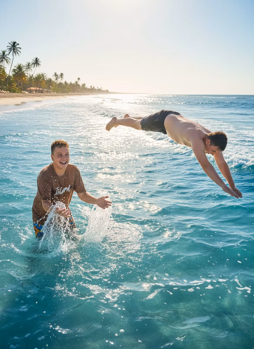 Лариса Примоченко – Two young people swimming and playing in the crystal clear blue sea water, joyful summer beach scene. The person wear…